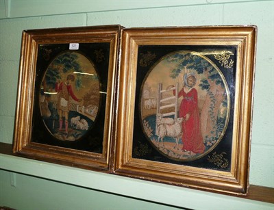 Lot 521 - A pair of late 18th century gilt framed wool embroidered and silk pictures, of a shepherd and...