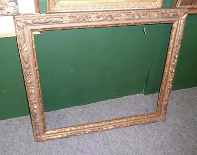 Lot 565 - An 18th century carved wooden mirror frame