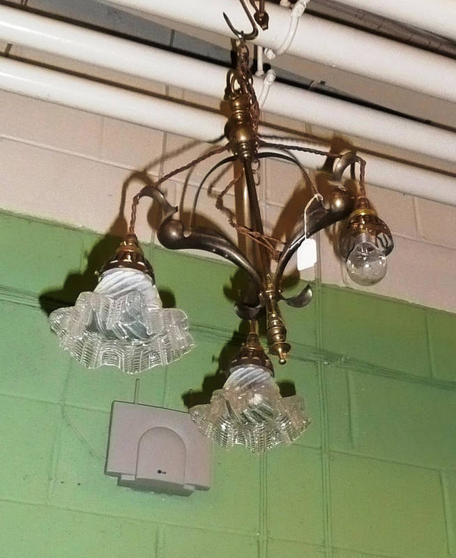 Lot 799 - A Benson style light fitting with two later shades