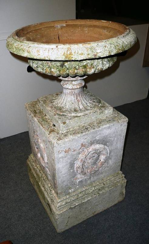 Lot 895 - Terracotta urn on pedestal