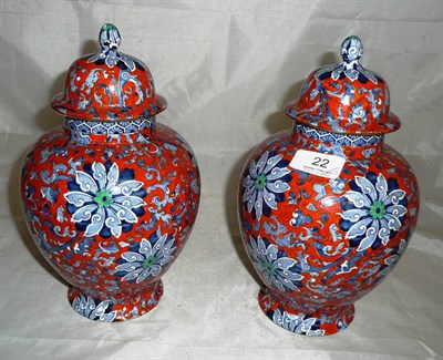 Lot 22 - Pair of Woods & Sons vases and covers 'Chung' pattern, by Frederick Rhead