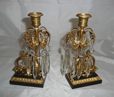 Lot 24 - Pair of 19th century bronze lustre candlesticks