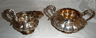 Lot 34 - A Victorian silver sugar basin and cream jug
