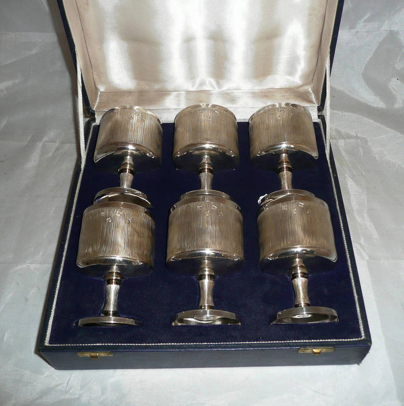 Lot 36 - A set of six goblets, by Royal Irish Silver Co, Sheffield 1973, each with textured bucket bowl,...