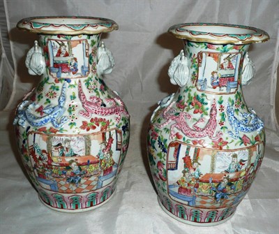 Lot 39 - A pair of famille rose Canton vases