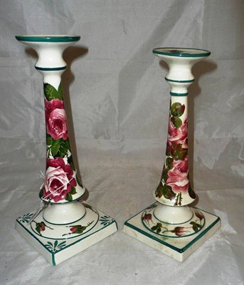 Lot 45 - A pair of Wemyss rose painted candlesticks
