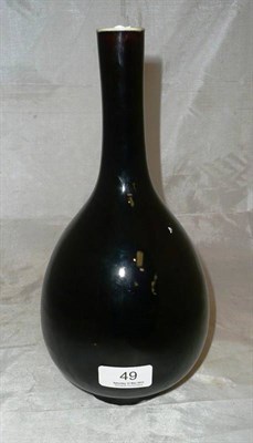 Lot 49 - A Chinese famille noire Ching bottle vase