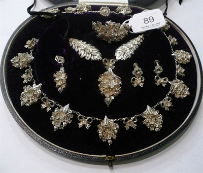 Lot 89 - A silver filigree suite of jewellery, (fragile - and in damaged condition) cased by Harrison...