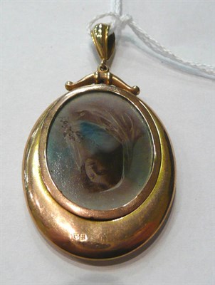 Lot 97 - A Victorian double sided locket pendant with bead decoration