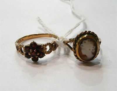 Lot 130 - A 9ct gold cameo ring and a 9ct gold garnet set ring (2)