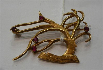 Lot 137 - A willow tree brooch, set with rubies, stamped '18K'