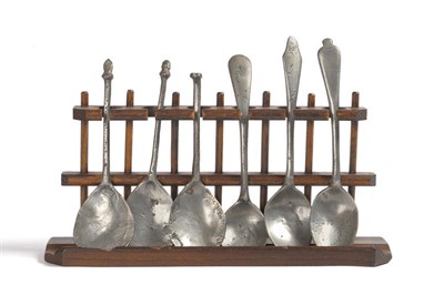 Lot 161 - A 17th century iron cooking pot and a spoon rack containing six 17th/18th century pewter spoons