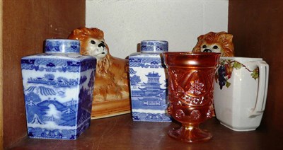 Lot 177 - Pair of seated pottery lions, two Ringtons caddies and covers, Ringtons jug and lustre vase