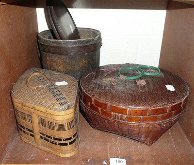 Lot 180 - A staved oak vessel, a Japanese wicker sewing basket, a wicker lozenge shaped basket and two...