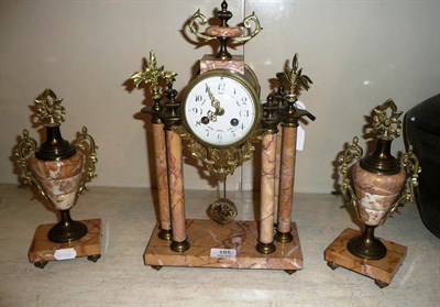 Lot 185 - A French clock garniture