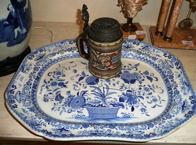 Lot 187 - A Mettlach stein and a blue and white meat dish