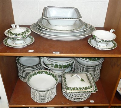 Lot 195 - An extensive Meissen green and gilt decorated dinner service (on two shelves)