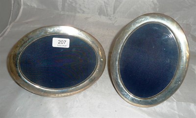 Lot 207 - Two oval silver mounted easel back photo frames, 20th century, Sheffield marks