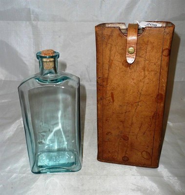 Lot 208 - A leather cased travelling decanter, by Edwin S Hill