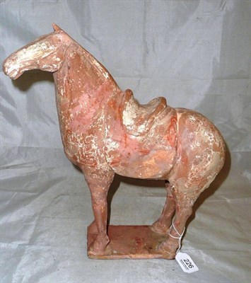 Lot 226 - A Chinese Tong horse with signs of original paint work (restored)