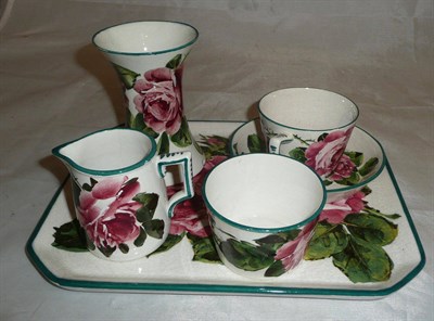 Lot 227 - A Robert Heron "Wemyss Ware" teaset for one, each piece painted with pink roses, bottle green lined