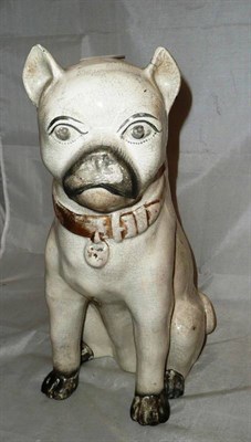 Lot 231 - A large Earthenware model of a pug dog with gilt collar