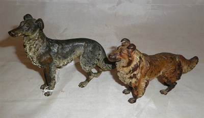 Lot 243 - A cold painted bronze figure of a dog, 8cm high and a larger example 10cm high