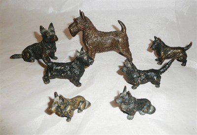 Lot 244 - Seven small bronze cast figures of Scottish and other terrier dogs (all previously mounted),...