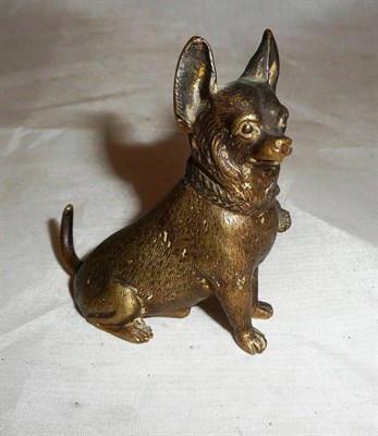 Lot 256 - A polished metal figure of a Chihuahua, 6cm high