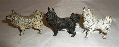 Lot 261 - Two cold painted bronze figures of Pomeranian dogs, 5.5cm and 4.5cm high, and a bronze cast example