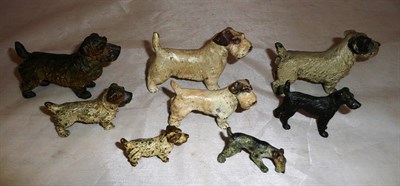 Lot 266 - Eight assorted bronze painted terrier dog figures of varying sizes (some previously mounted),...