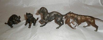 Lot 273 - Four bronze dog figures, the largest 8.5cm high, all previously mounted