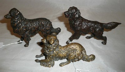 Lot 277 - Two bronze figures of dogs and a brass figure of a dog seated