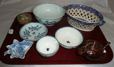 Lot 283 - An English porcelain slop bowl, tea bowl and saucers, possibly Liverpool, a chestnut basket, pickle