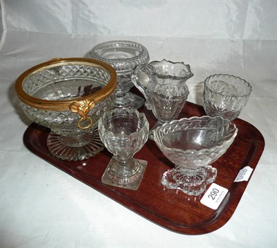 Lot 290 - A cut glass bowl with gilt rim and rams head handles and five pieces of Irish cut glass