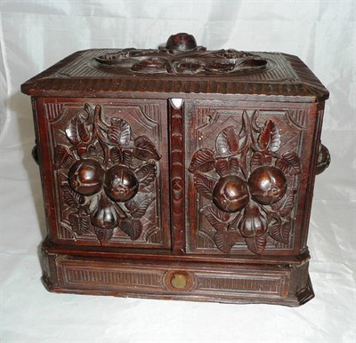 Lot 294 - A Victorian carved oak cigar casket