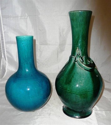 Lot 295 - A Chinese turquoise bottle vase and another Chinese bottle vase in green with lizard (2)