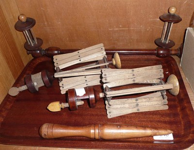 Lot 340 - A 19th century mahogany wool winder, two clamped wool winders and lid (a.f.) (4)