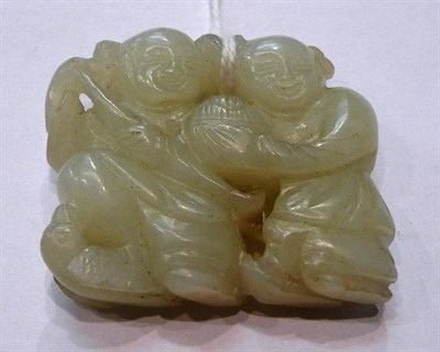 Lot 345 - A carved jade figure group, 4cm high