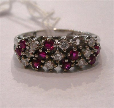 Lot 356 - An 18ct white gold, ruby and diamond ring (one stone missing)