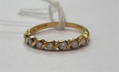 Lot 358 - An 18ct gold diamond half eternity ring