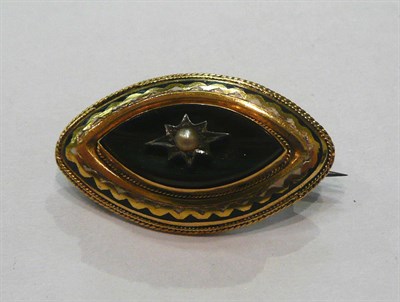 Lot 369 - A Victorian jet and seed pearl and enamelled brooch