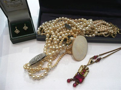 Lot 383 - An Art Deco costume jewellery necklace, a marcasite watch, three double clip brooches, paste...