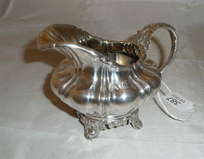 Lot 387 - Georgian silver jug