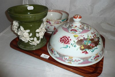 Lot 403 - Three famille rose bowls with dish cover and encrusted flower pot