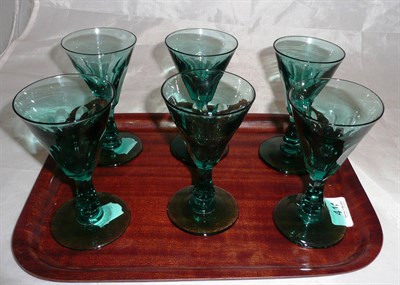 Lot 411 - A set of six 19th century green wine glasses