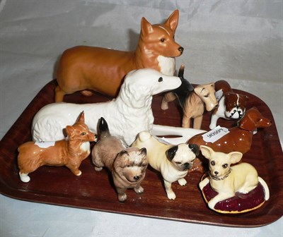 Lot 412 - Eight Beswick dog figures and one other