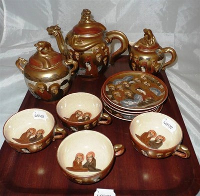 Lot 413 - A Japanese Satsumaware part tea set (10)