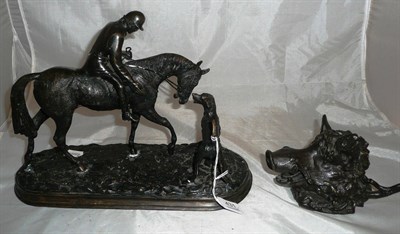 Lot 431 - A bronze figure of a mounted huntsman with hound, together with a cast bronze inkwell in the...