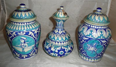 Lot 440 - Three Isnic style lidded vases